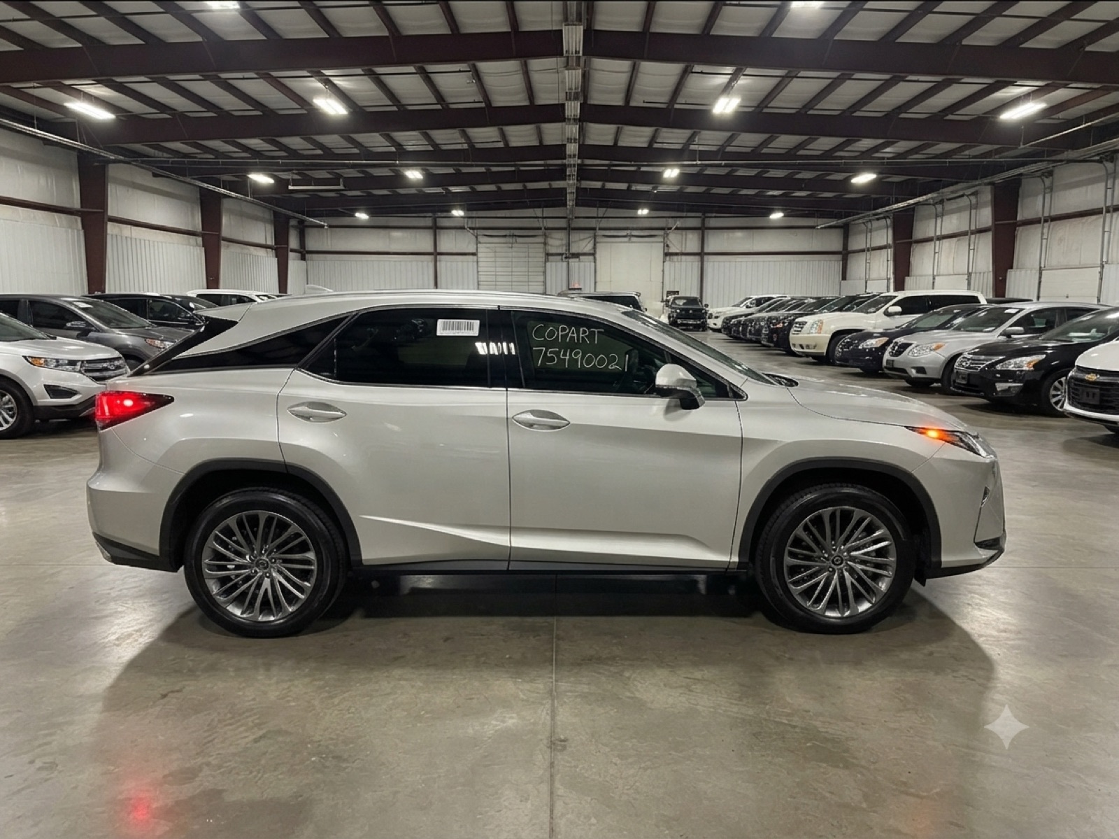 2020 Lexus RX 350 in an auction storage building